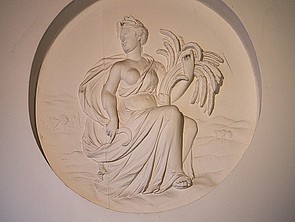 Jan Goeree (toegeschr.) De graangodin Ceres met sikkel en halmen in de benedengang van Singel 124.