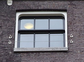 Herengracht 22 detail raam met ronde hoeken